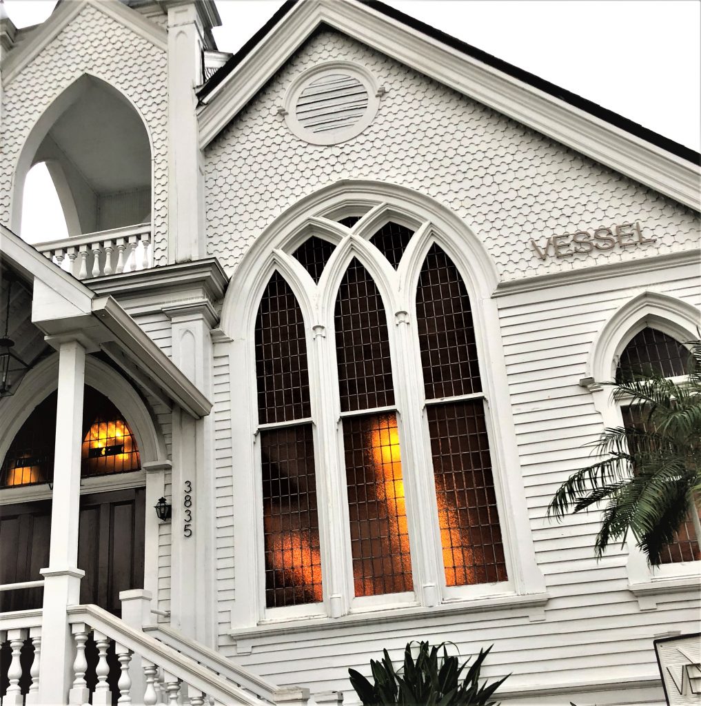 a white church with a white staircase