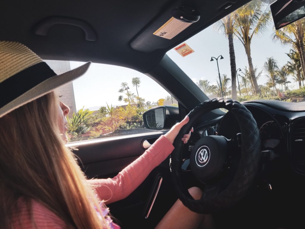 a woman driving a car