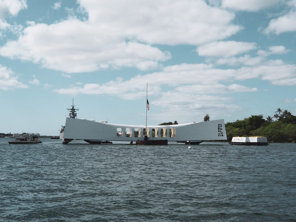 a white building on the water