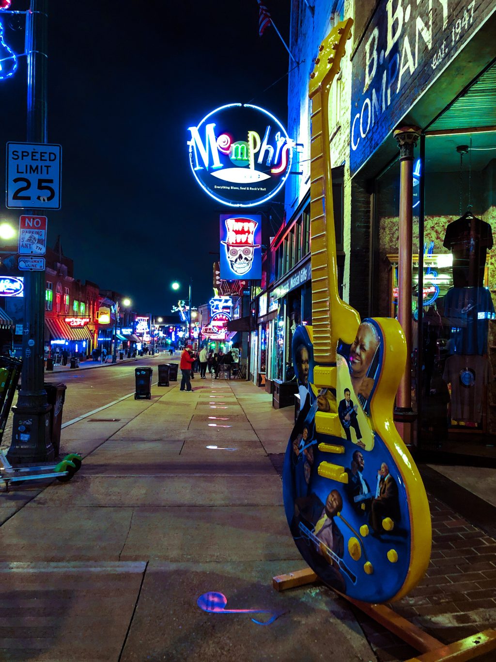 a street with a guitar on it