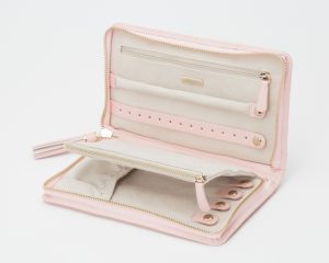 a pink and white jewelry case