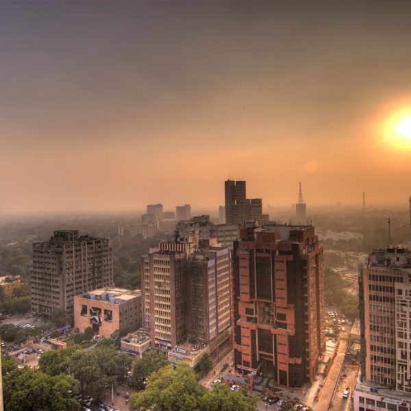 a city with many tall buildings and trees