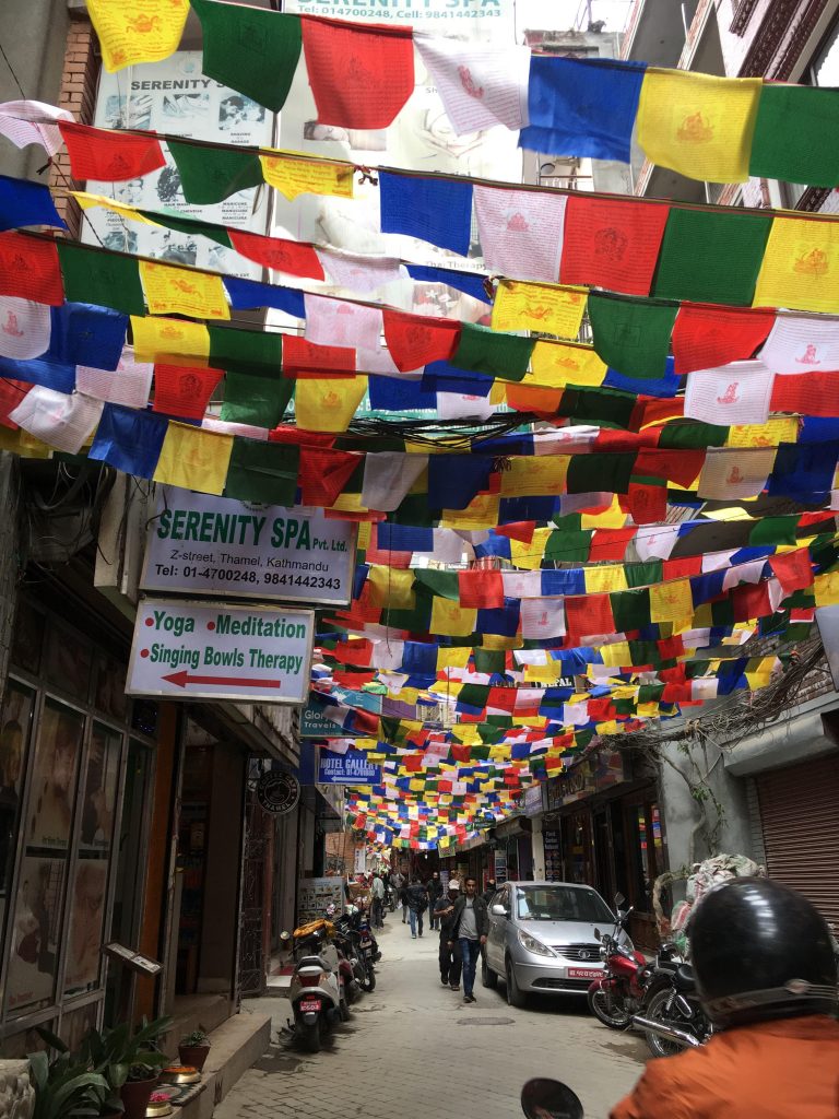 a street with many colorful flags