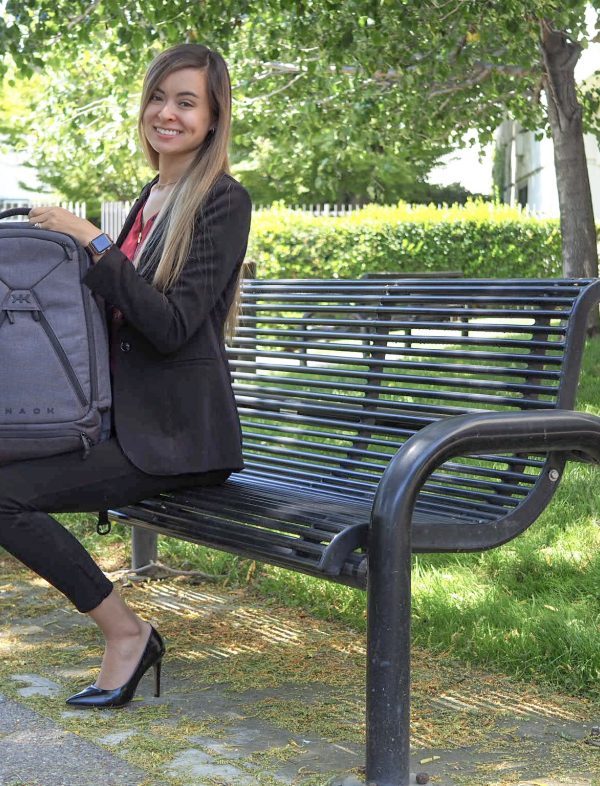 Sitting on bench with my Knack Pack, a professional backpack for business travel