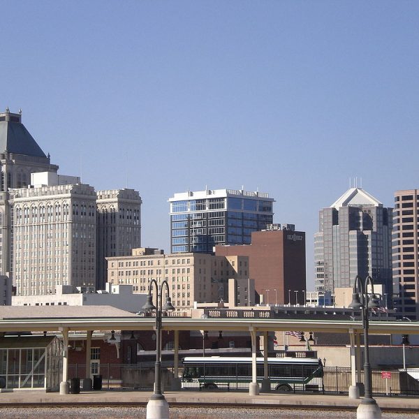 a city skyline with a bus stop