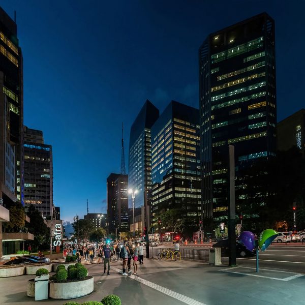 Potsdamer Platz street with tall buildings and people walking