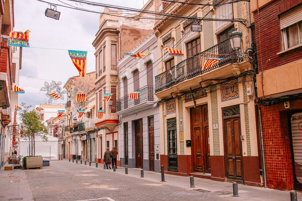a street with flags on the side