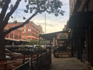 a street with buildings and trees