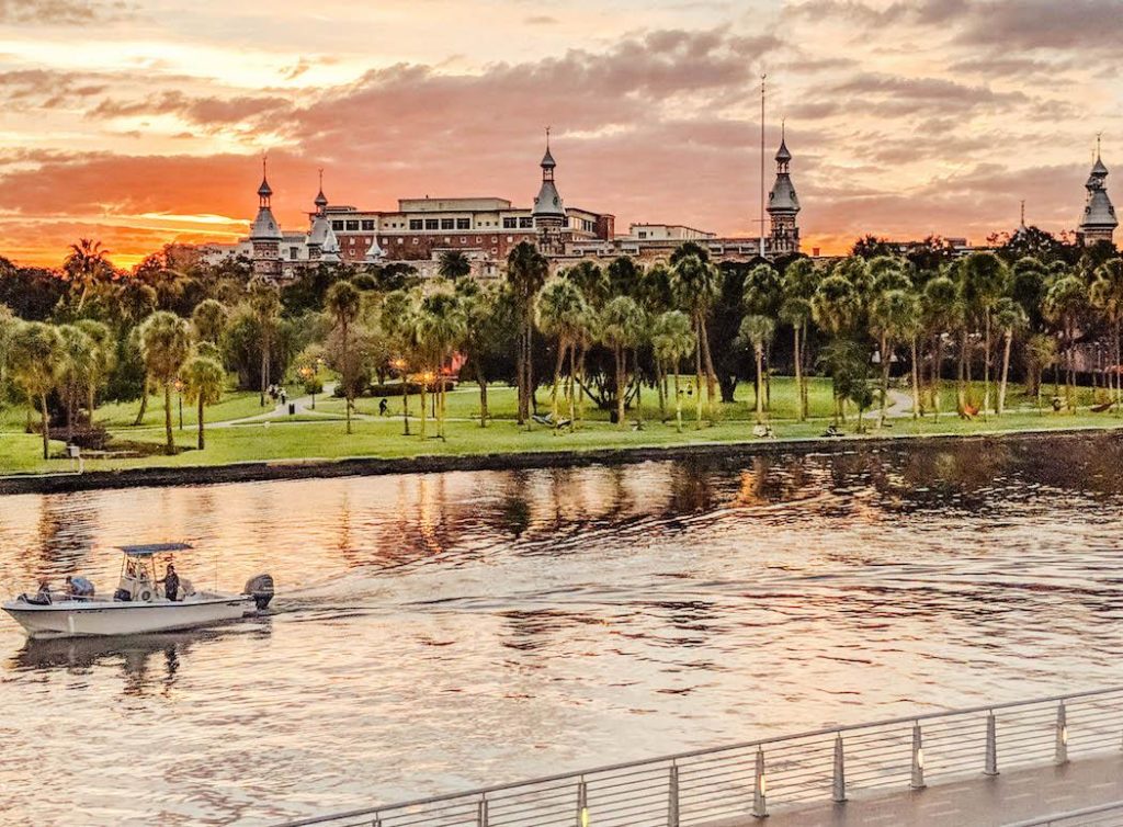 Sunset view of the Tampa Riverwalk and the University of Tampa from Remedy