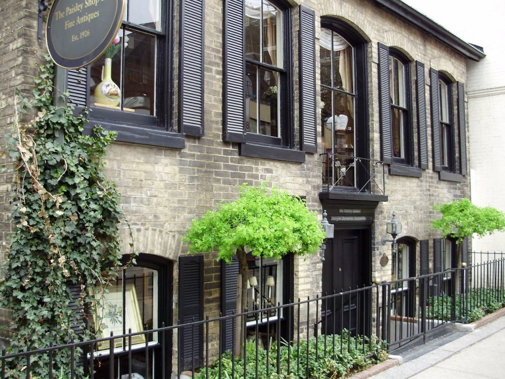 a building with black shutters