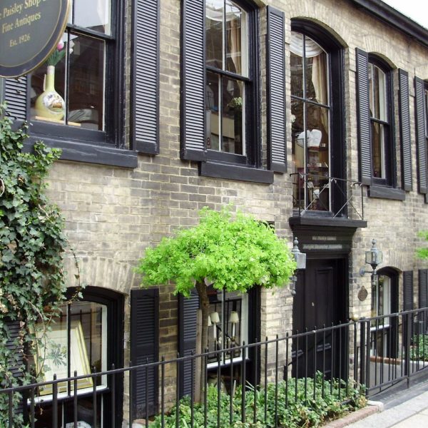 a building with black shutters