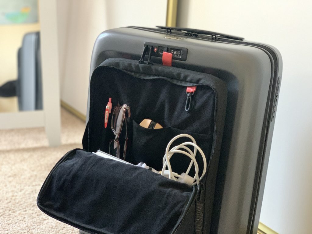 a suitcase with a bag inside
