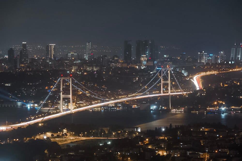 a bridge with lights at night