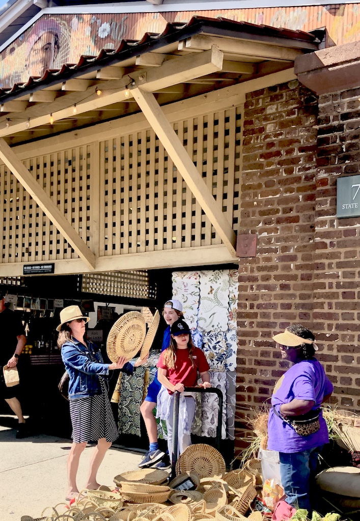 a group of people outside a store