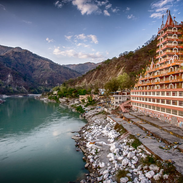 a building next to a river