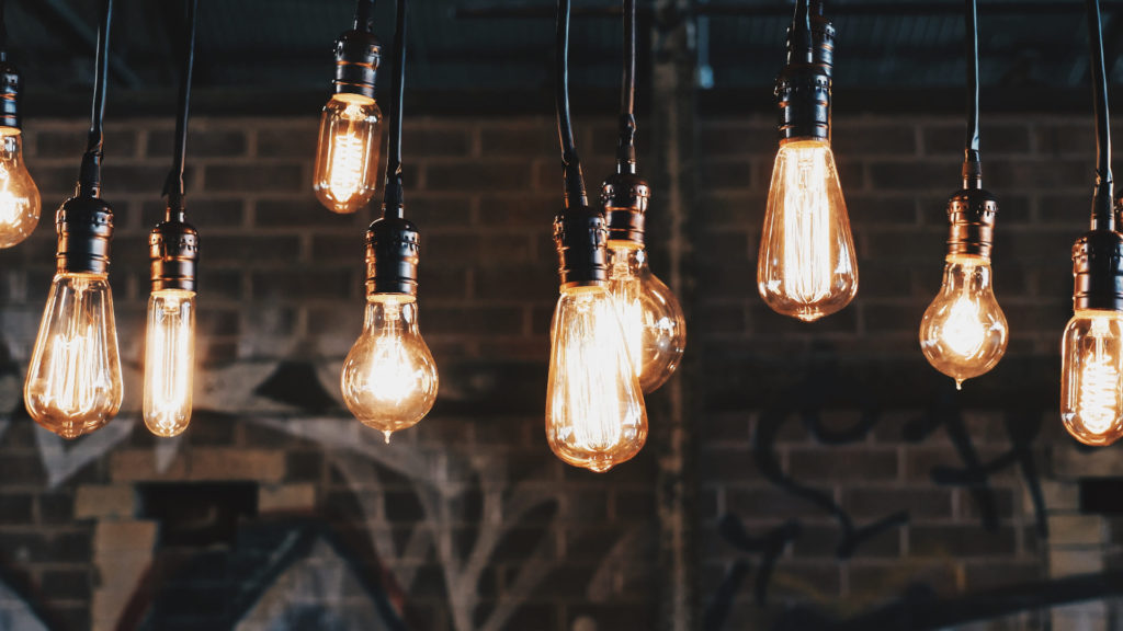 a group of light bulbs from a ceiling