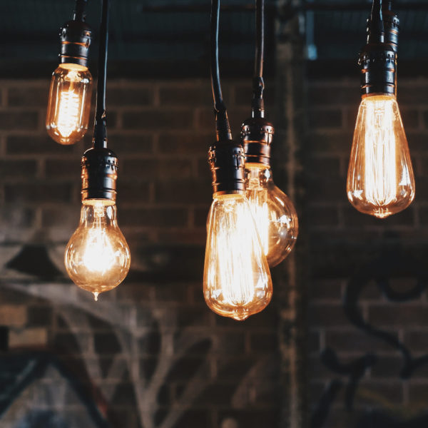 a group of light bulbs from a ceiling