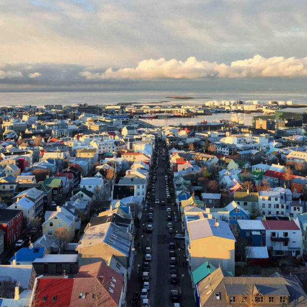 a city with many buildings and a body of water