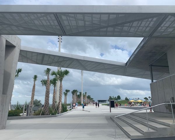 a building with a roof over a walkway