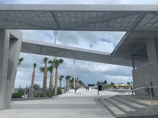 a building with a roof over a walkway