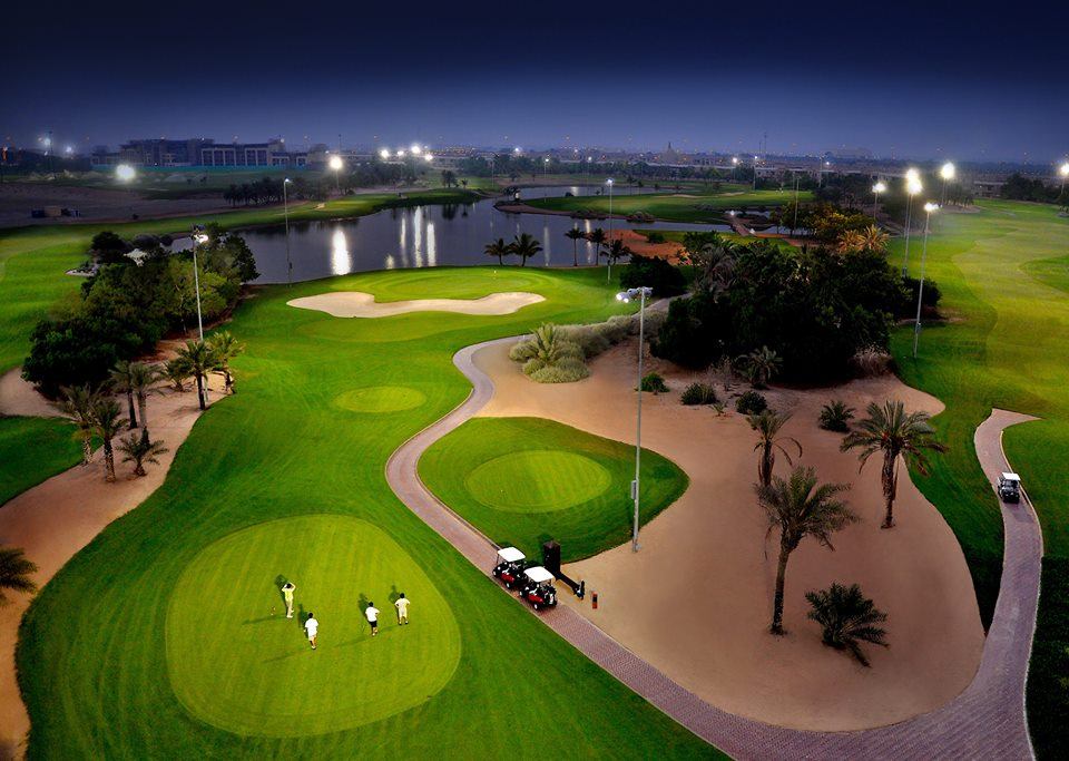 a group of people playing golf