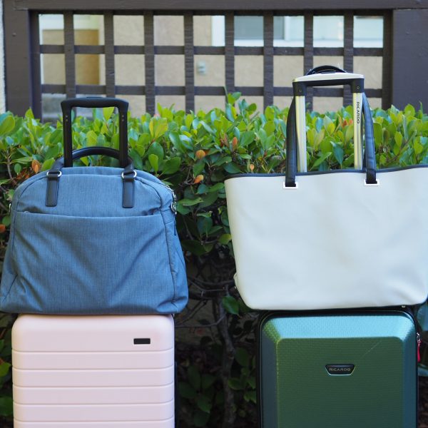 a group of luggage bags on top of each other