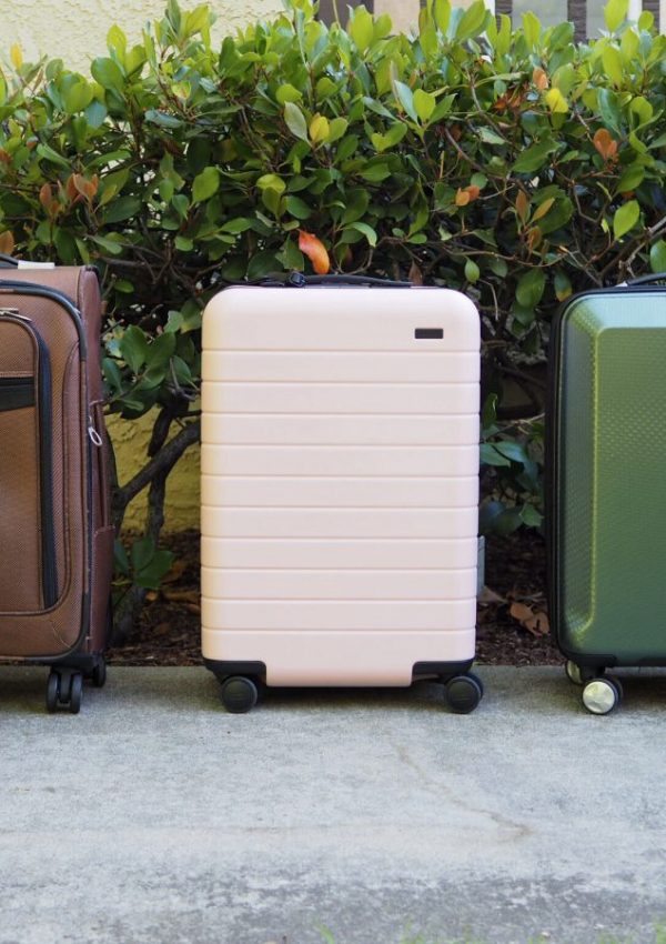 a group of luggage on the sidewalk
