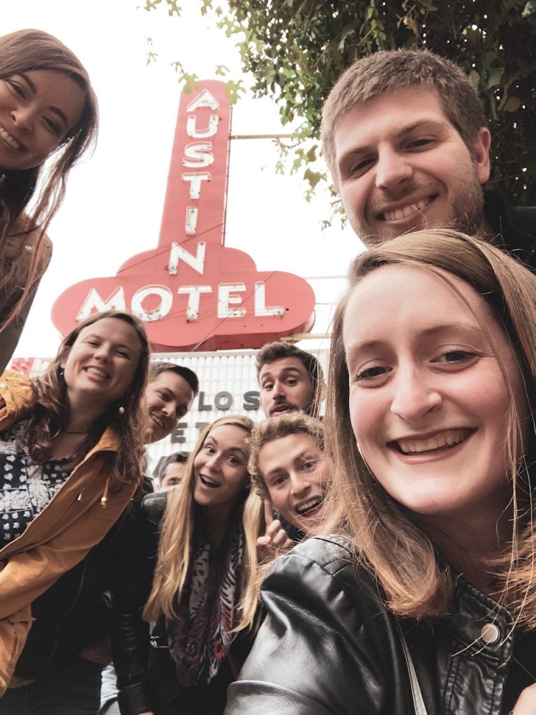 a group of people taking a selfie